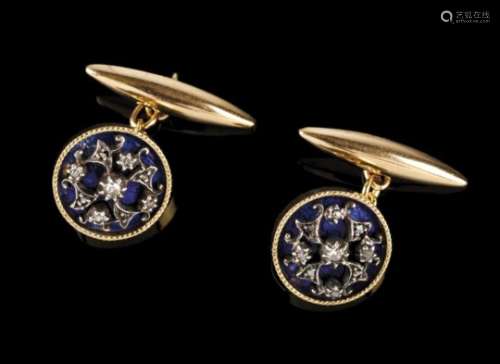 A pair of cufflinksCircular, blue enamelled with applied silver rose set with small rose cut