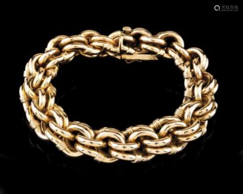 A braceletPortuguese goldFrieze work of large rings and twisted threadEncased clasp with safety