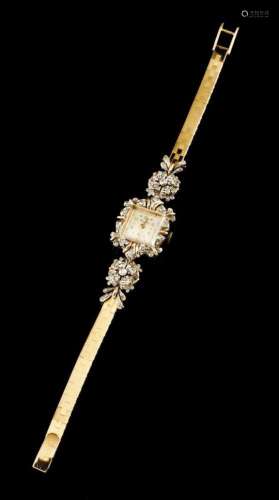 A Cortébert watchBicoloured goldLady's model set with 2 small antique brilliant cut diamonds and