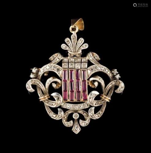 A pendant broochSilver and goldRomantic decoration with volutes, feathers and scrolls, set with