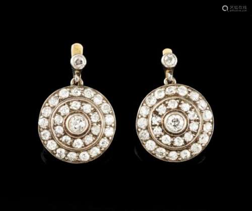 A pair of earringsGold and silverCircular, set with 2 antique brilliant cut diamonds totalling (ca.