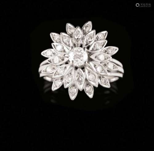 A ringLow purity goldTriple band with flower top; petals set with small 8/8 cut diamonds centred