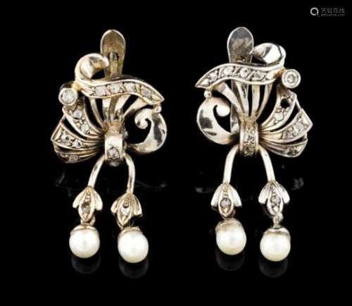 A pair of earringsGoldStylised volutes set with small rose cut diamonds with 4 pendant