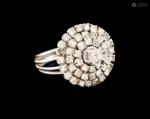 A ringPlatinumFour thread band with circular top fully set with 8/8 cut diamonds (ca.1.50ct) and a