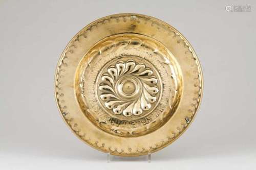 A Nuremberg offerings plateYellow metalRaised and engraved decorationInscribedGermany, 16th /17th