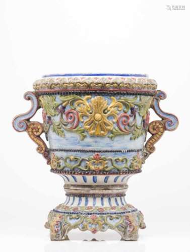 A vase with standFaiencePolychrome and raised decoration with scrolls, flowers and foliage