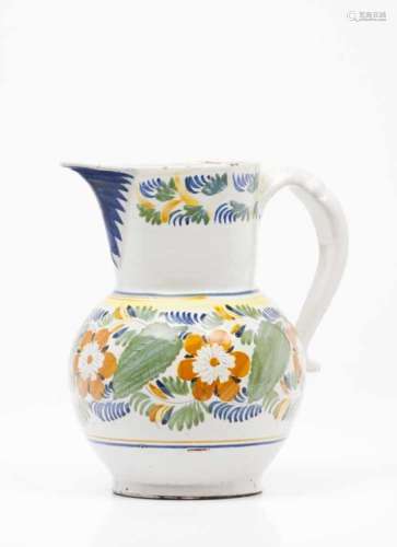 A jugFaiencePolychrome decoration with flower and foliage motifsPortugal, 19th centuryHeight: 24 cm-