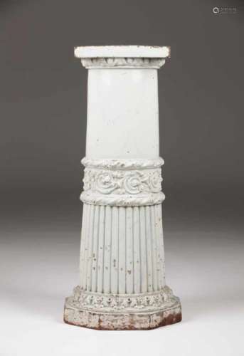 An urn on standFaienceStand of marbled and raised floral and foliage decorationScalloped