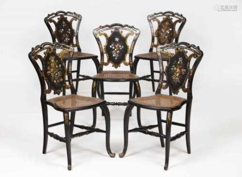 A set of six Napoleon III chairsBlack lacquered woodGilt and mother-of-pearl inlaid decorationCane