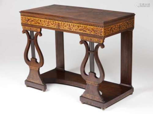 An Empire style console tableDarkened wood with various timbers marquetry bandFlower and foliage