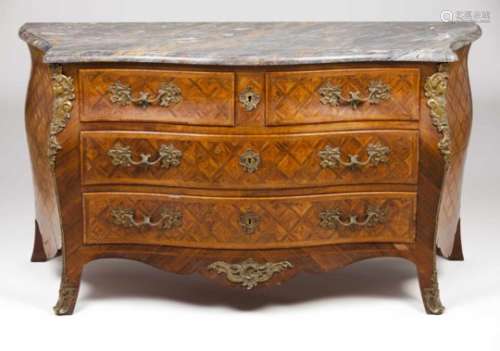 A Regence style commodeRosewood and jacaranda marquetry workMarble topTwo short and two long