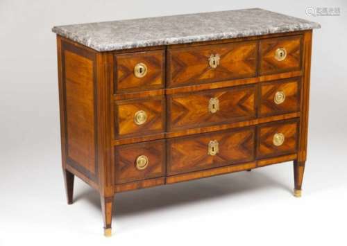 A Louis XVI commodeJacaranda, mahogany and rosewoodTwo long drawersGilt bronze hardware and marble