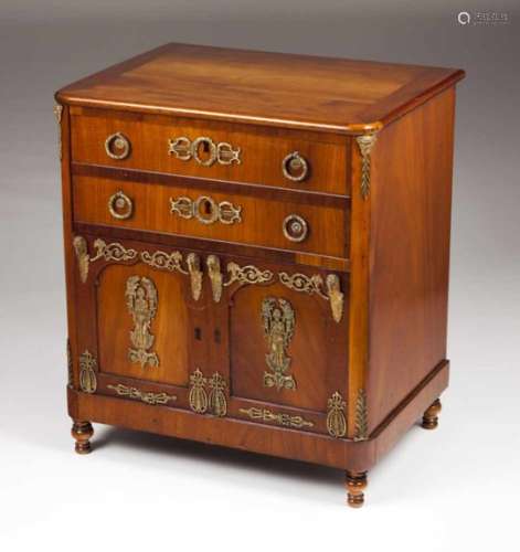 An Empire style pot cupboardMahoganyTwo simulated drawers to front and two doorsYellow metal