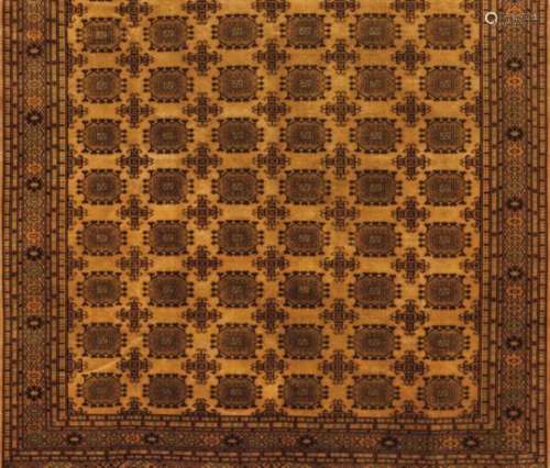 A Turkaman rug, IranWool and cotton of geometric design in beige, brown and green255x205 cm- - -15.