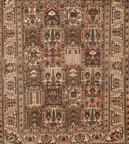 A Bakhtiari rug, IranWool and cotton of geometric design in beige, brown and salmon200x155 cm- - -