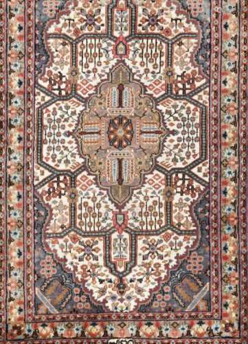 An Ardabil rug, IranSilk, of floral and geometric design in blue, beige and bordeaux155x90 cm- - -