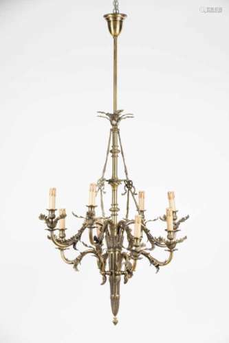 An 8 branch chandelierGilt metalMoulded quiver with arrow shaped decoration with foliage
