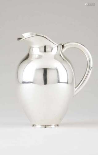 An Art Deco water jugPortuguese silverPlain body with tubular handleLisbon hallmark, Eagle 833/000