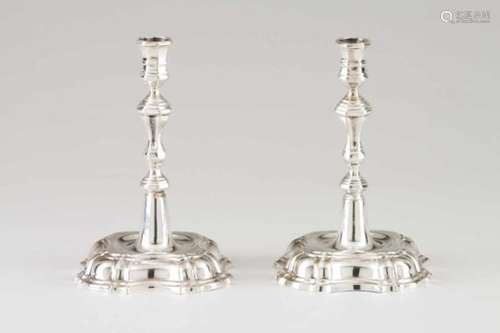 A pair of candlesticksEnglish silverRaised and relief stand of faceted shaft in the 17th century