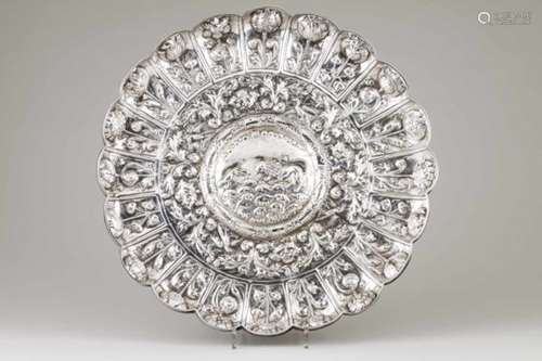 A twenty gadroons display salverPortuguese salver 1st halt 18th centuryRepousse and chiselled