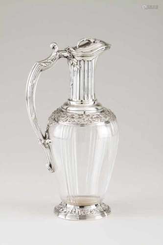 A jugFrench silver an decorated glassRaised friezes of foliage and grape motifsFluted handle of