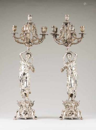 A pair of 6 branch candelabraSilvered metalRococo decorated stands of scrolls and flower motifs