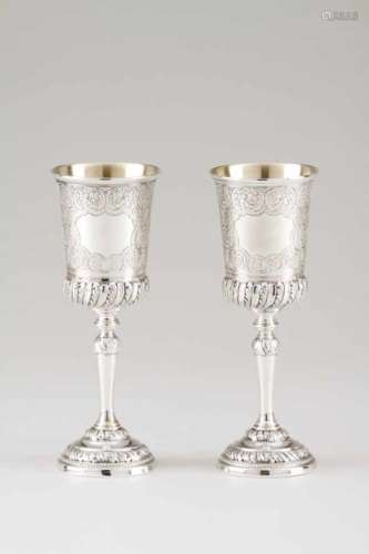 A pair of drinking vesselsPortuguese silver Raised and chiselled floral and foliage decorationLisbon