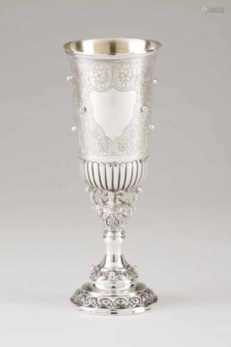 A tall drinking vesselPortuguese silver Profuse engraved floral and foliage decoration with raised