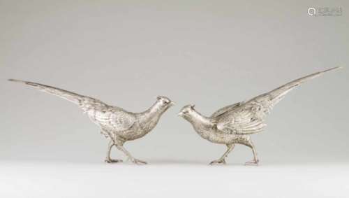 A pair of pheasantsGerman silverCut, repousse and chiselled sculpturesArticulated hinged