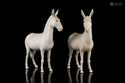 PAIR OF CHINESE EXPORT PORCELAIN DONKEY FIGURES