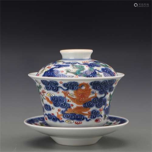 A Chinese Dou-Cai Glazed Porcelain Tea Cup with Cover and Plate