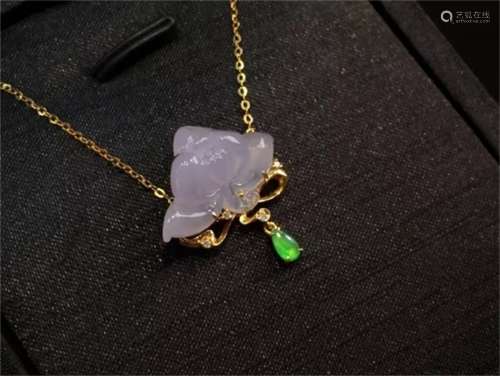 A Chinese Carved Purple Jadeite Necklace