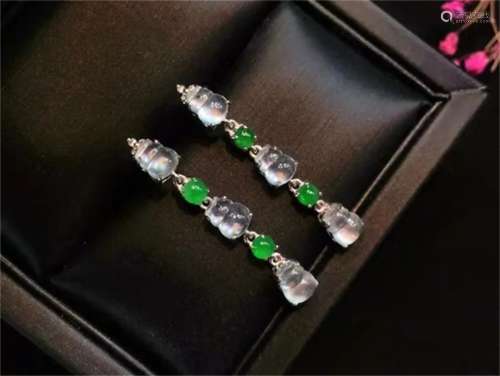 A Pair of Chinese Carved Jadeite Ear Rings