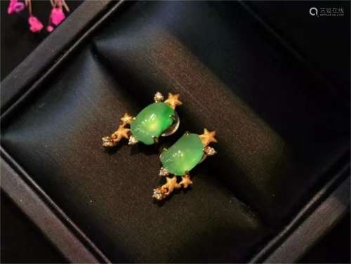 A Pair of Chinese Carved Jadeite Ear Rings