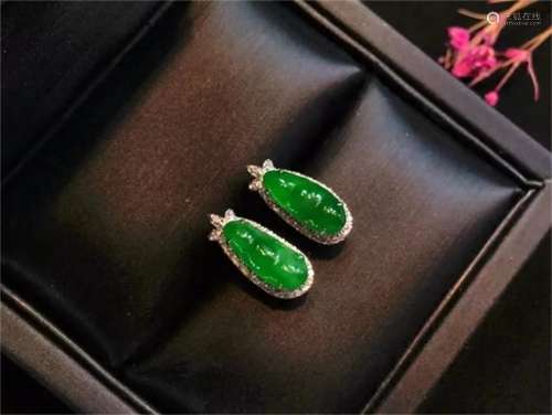 A Pair of Chinese Carved Jadeite Ear Rings