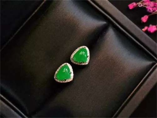 A Pair of Chinese Carved Jadeite Ear Rings