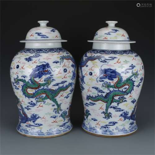 A Pair of Chinese Wu-Cai Glazed Porcelain Jars with Covers