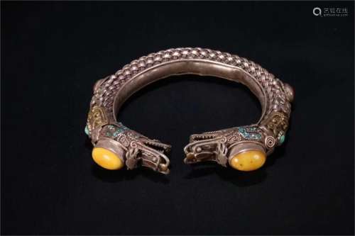 A Chinese Silver Bracelet with Amber Inlaid