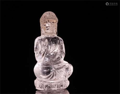 A Chinese Carved Rock Crystal Figure of Buddha