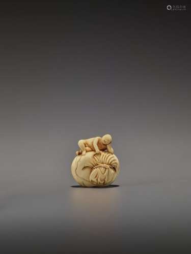 AN EARLY IVORY NETSUKE OF A NAKED MAN SLEEPING ON …