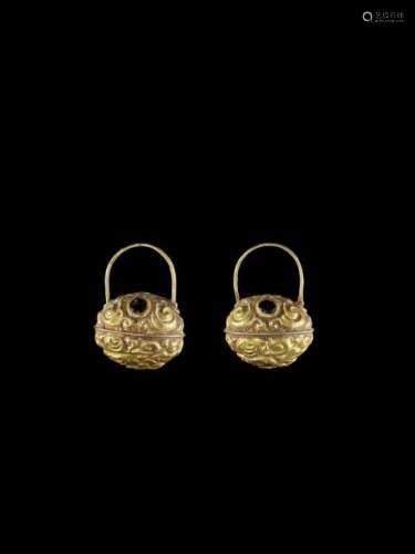 A PAIR OF BELL SHAPED CHAM REPOUSSÉ GOLD EAR ORNAM…