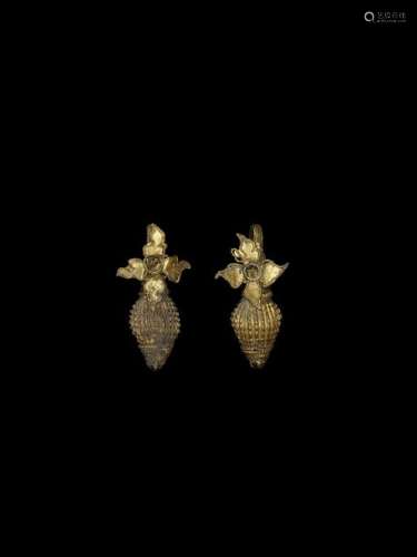 A PAIR OF INDIAN GOLD EAR ORNAMENTS WITH CONCH AND…