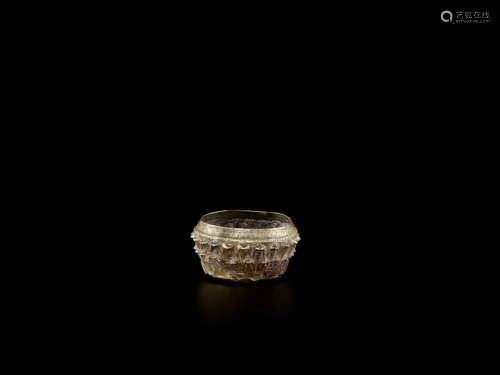 A SMALL CAMBODIAN GOLD RITUAL VESSEL WITH LOTUS LE…