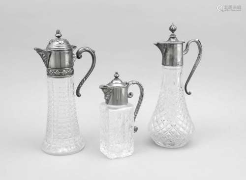 Three decanters with asse