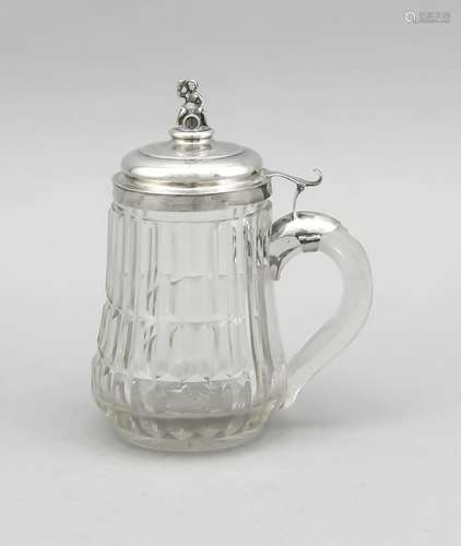 Glass pitcher with silver