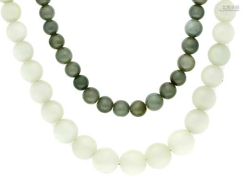 2 jade necklaces with lig