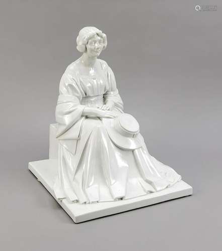 Lady on stone base,