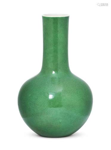 A Chinese monochrome porcelain vase, tianqiuping, 19th century, with allover apple-green glaze