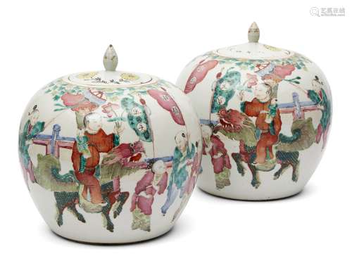 A pair of Chinese porcelain jars and covers, late 19th century, each painted in famille rose enamels