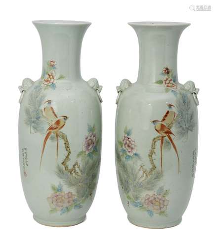 A pair of large Chinese porcelain baluster vases, 20th century, painted in famille rose enamels with